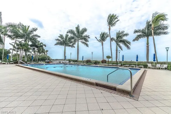 a view of a fountain with a fountain in front of a house