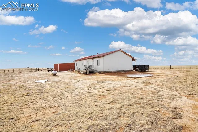 a view of pool with ocean view