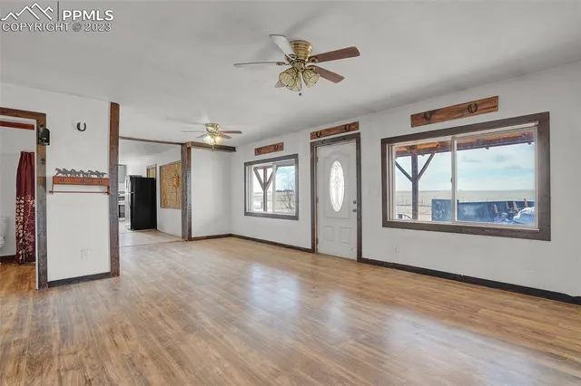 a view of an empty room with a window