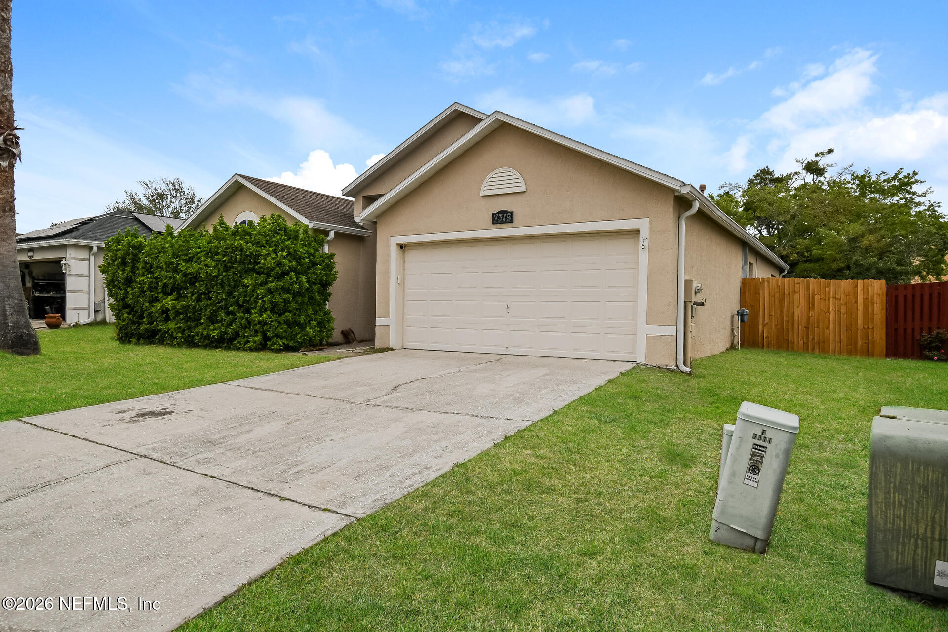 7319 Wood Duck Road Jacksonville, FL 32244 - Photo 2 of 21 a front view of house with a garden