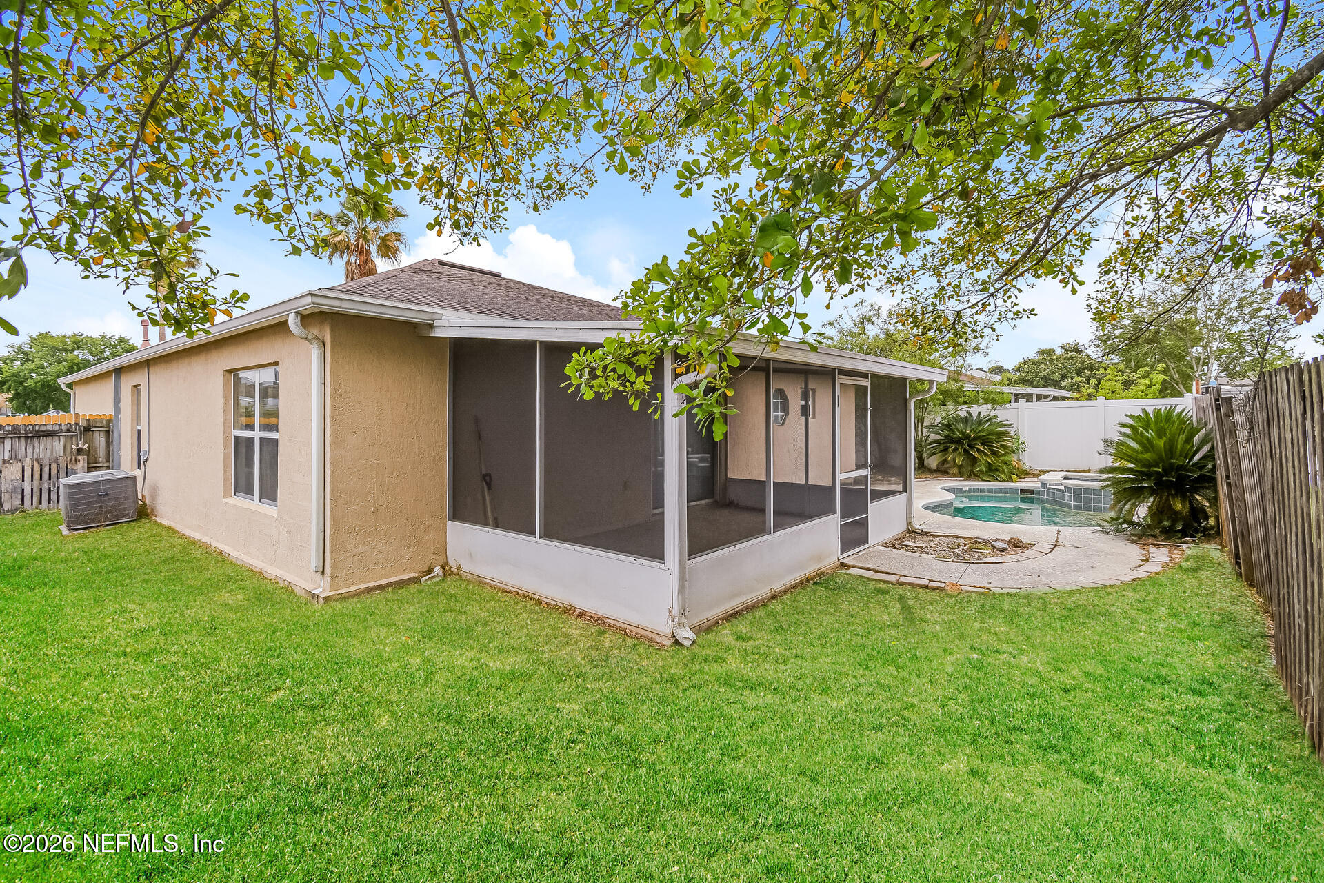7319 Wood Duck Road Jacksonville, FL 32244 - Photo 20 of 21 a view of a house with backyard and a garden