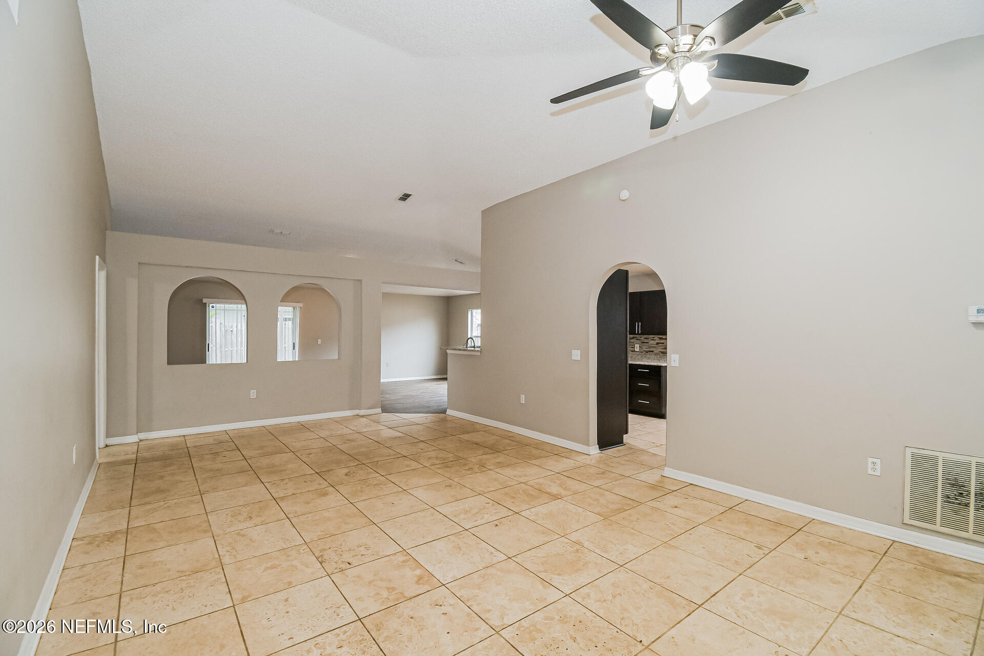 7319 Wood Duck Road Jacksonville, FL 32244 - Photo 6 of 21 a view of a livingroom with a staircase