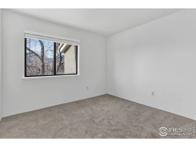 a view of an empty room with window