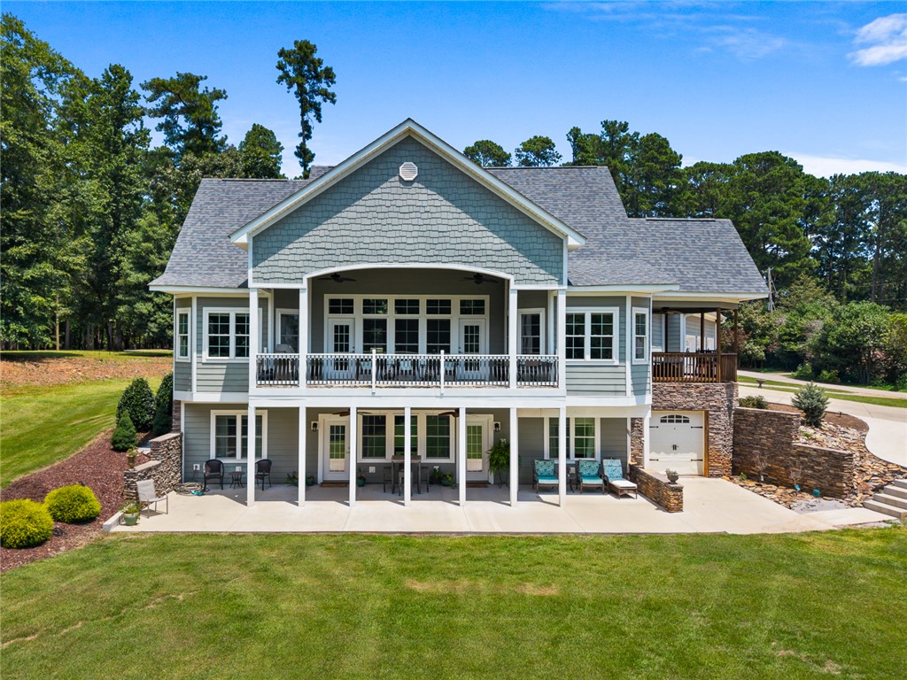 206 James Hare Road Anderson, SC 29626 - Photo 43 of 50 A grand dwelling presents multiple levels of outdoor living space, perfect for entertaining.
