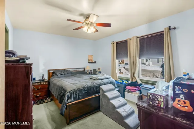 a bedroom with a bed and a closet