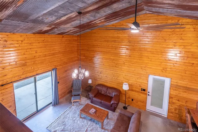 a bed sitting in a room next to a window