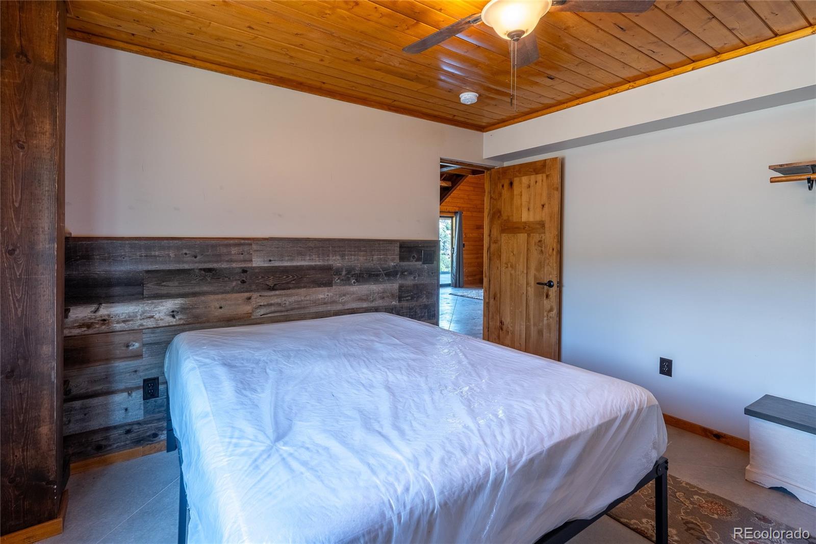 0 Picketwire Road Trinidad, CO 81082 - Photo 15 of 39 a bed sitting in a room next to a window