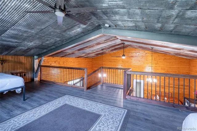 a view of porch with wooden floor