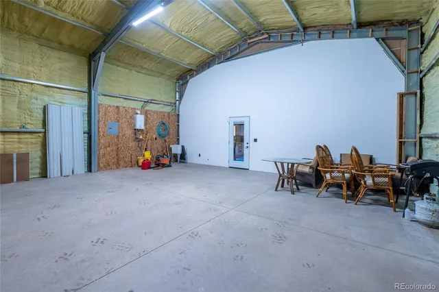 a view of livingroom with furniture and garage