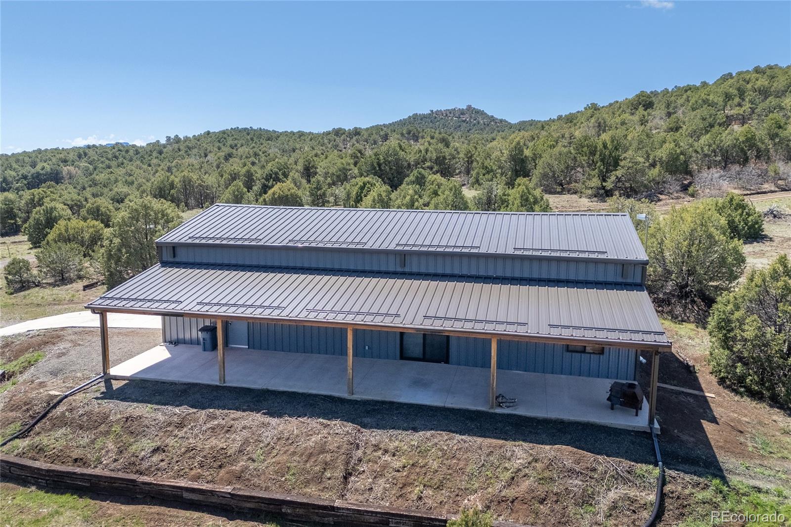 0 Picketwire Road Trinidad, CO 81082 - Photo 3 of 39 a view of a wooden deck with a bench