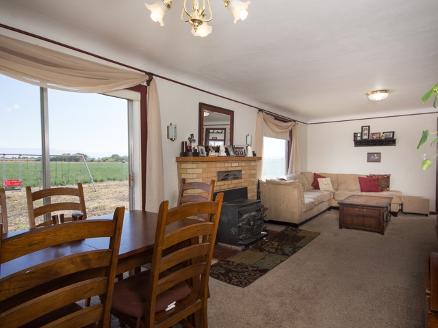 1102 21 Road Grand Junction, CO 81505 - Photo 3 of 20 a living room with furniture and a large window