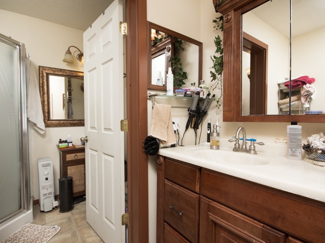 1102 21 Road Grand Junction, CO 81505 - Photo 7 of 20 a bathroom with a sink double vanity and a mirror