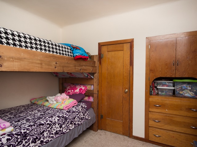 1102 21 Road Grand Junction, CO 81505 - Photo 8 of 20 a bedroom with a bed and a closet