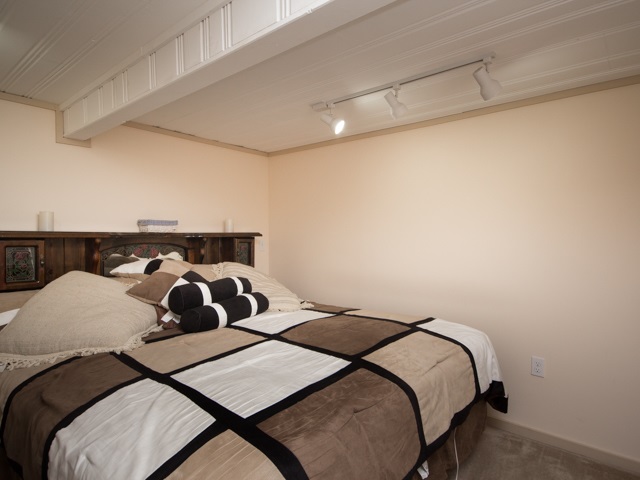 1102 21 Road Grand Junction, CO 81505 - Photo 10 of 20 a bedroom with a bed and window