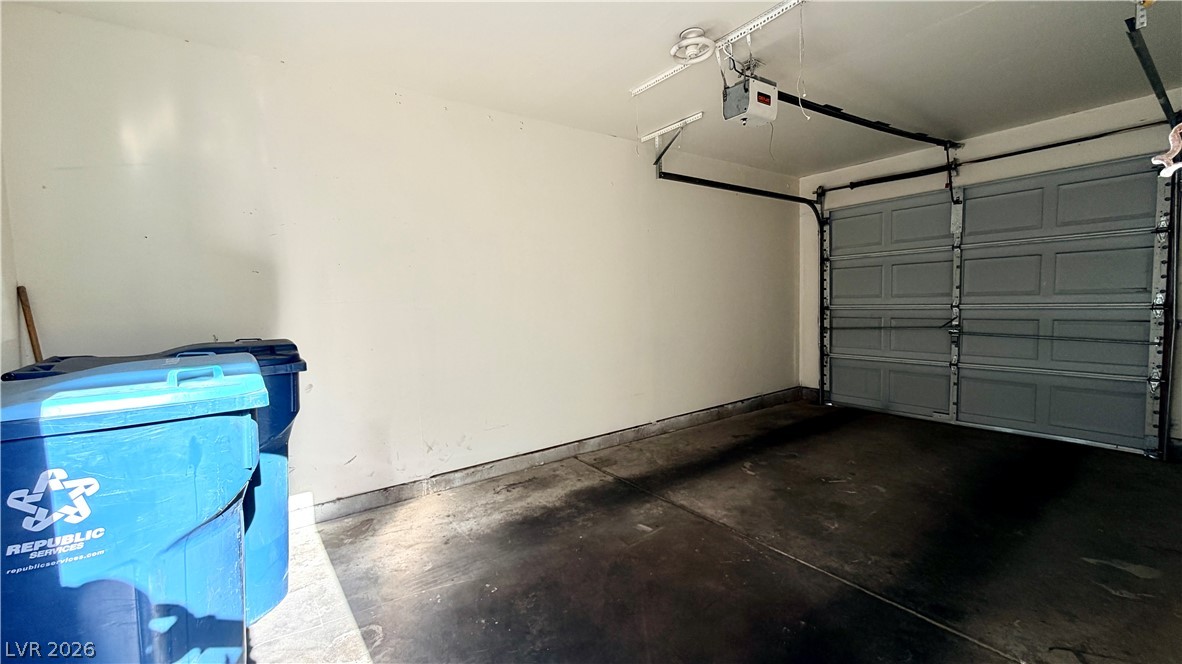 6250 West Flamingo Road, Unit 4 Las Vegas, NV 89103 - Photo 41 of 45 This spacious garage offers convenient parking and additional storage options.