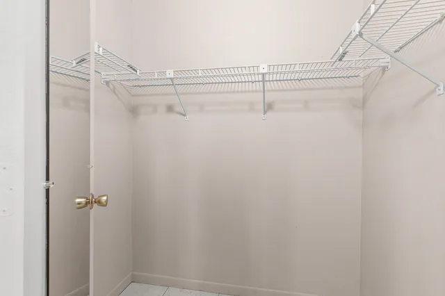 a view of a room with racks on the wall