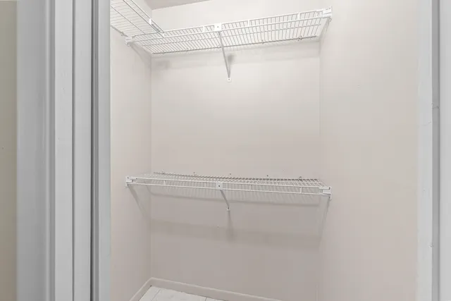 a view of a room with racks on the wall