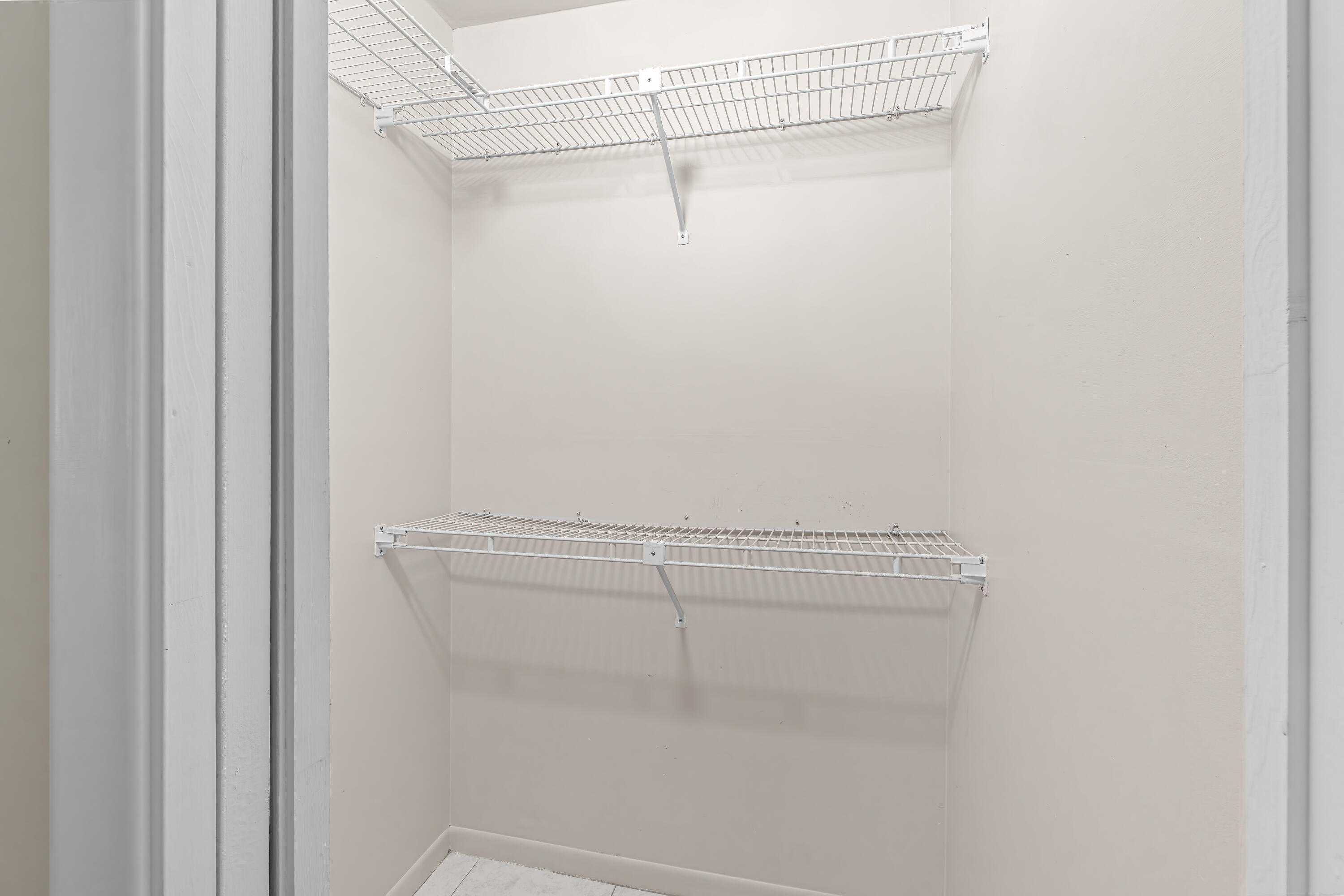 1521 Northwest 19th Terrace, Unit 202 Delray Beach, FL 33445 - Photo 24 of 32 a view of a room with racks on the wall