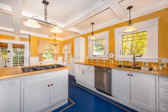 a kitchen with lots of counter space and a sink