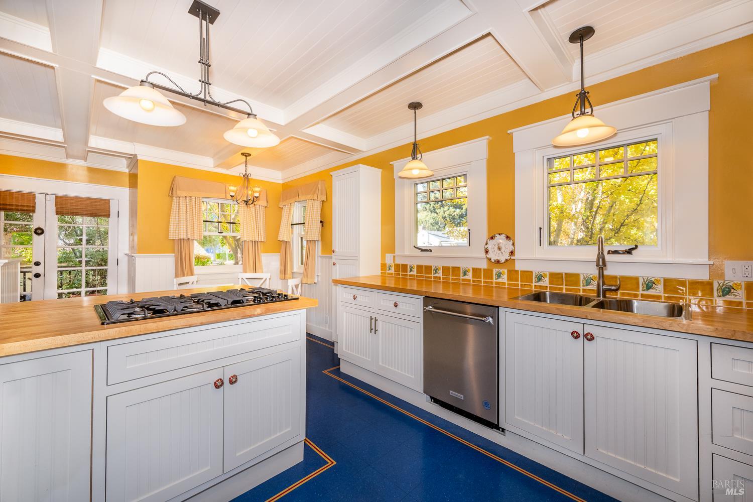 721 Spring Street Santa Rosa, CA 95404 - Photo 12 of 32 a kitchen with lots of counter space and a sink