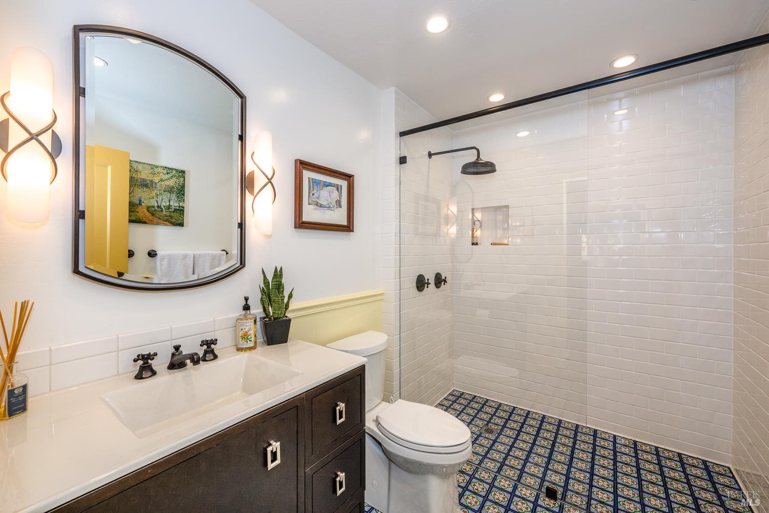 721 Spring Street Santa Rosa, CA 95404 - Photo 9 of 32 a bathroom with a sink toilet and shower