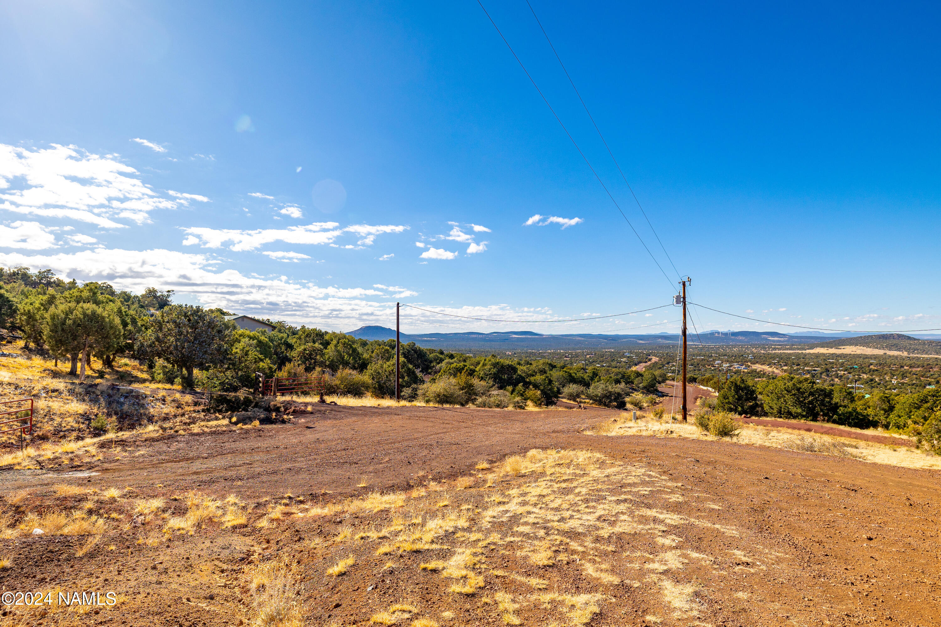 914 West Eagle Nest Road, Unit 9 Williams, AZ 86046 - Photo 14 of 15 a view of a town with palm trees