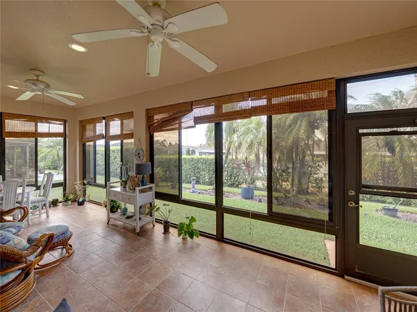 a view of a swimming pool with a yard