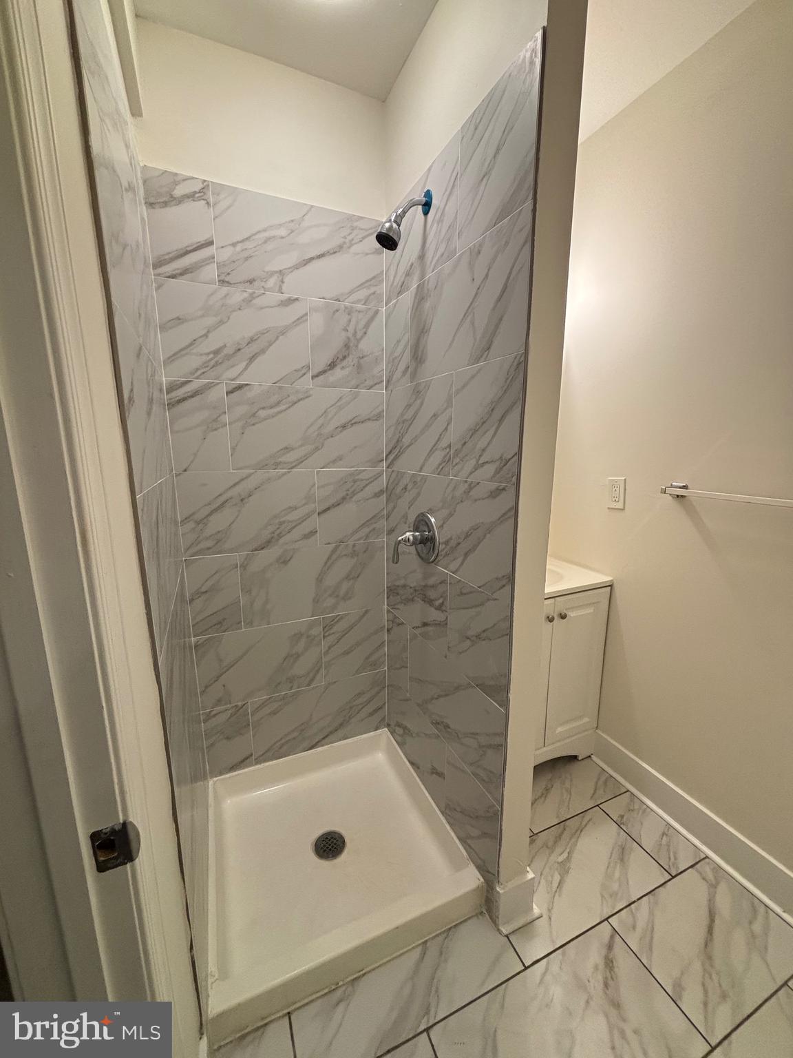 5427 Walnut Street, Unit F1 Philadelphia, PA 19139 - Photo 11 of 22 a bathroom with a tub