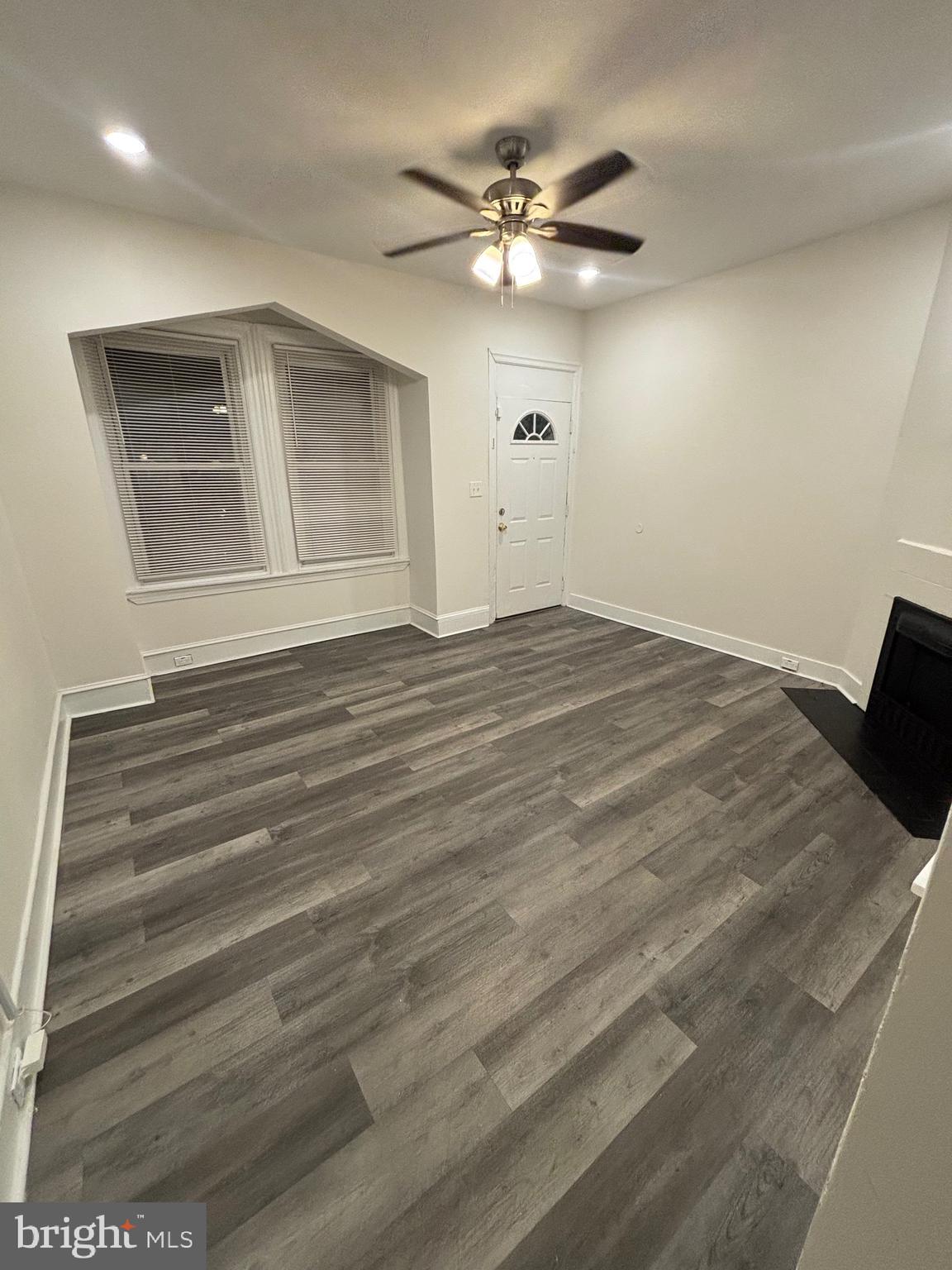 5427 Walnut Street, Unit F1 Philadelphia, PA 19139 - Photo 3 of 22 a view of an empty room with a chandelier fan