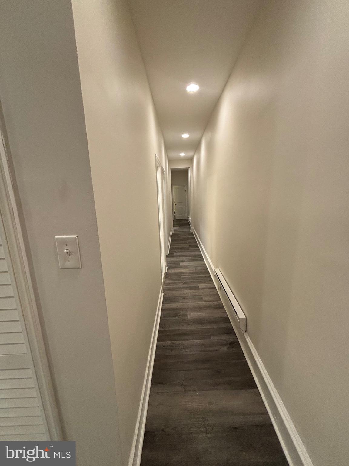 5427 Walnut Street, Unit F1 Philadelphia, PA 19139 - Photo 9 of 22 a view of a hallway with wooden floor