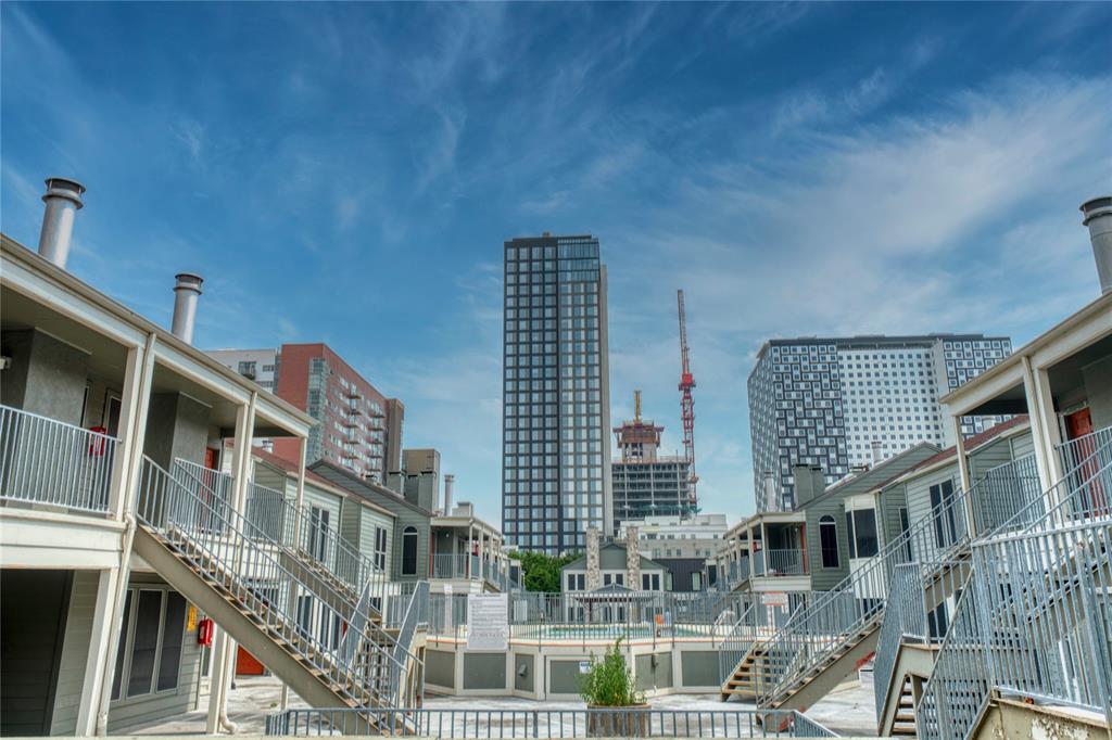 2529 Rio Grande Street, Unit 81 Austin, TX 78705 - Photo 11 of 13 a front view of a building with glass windows
