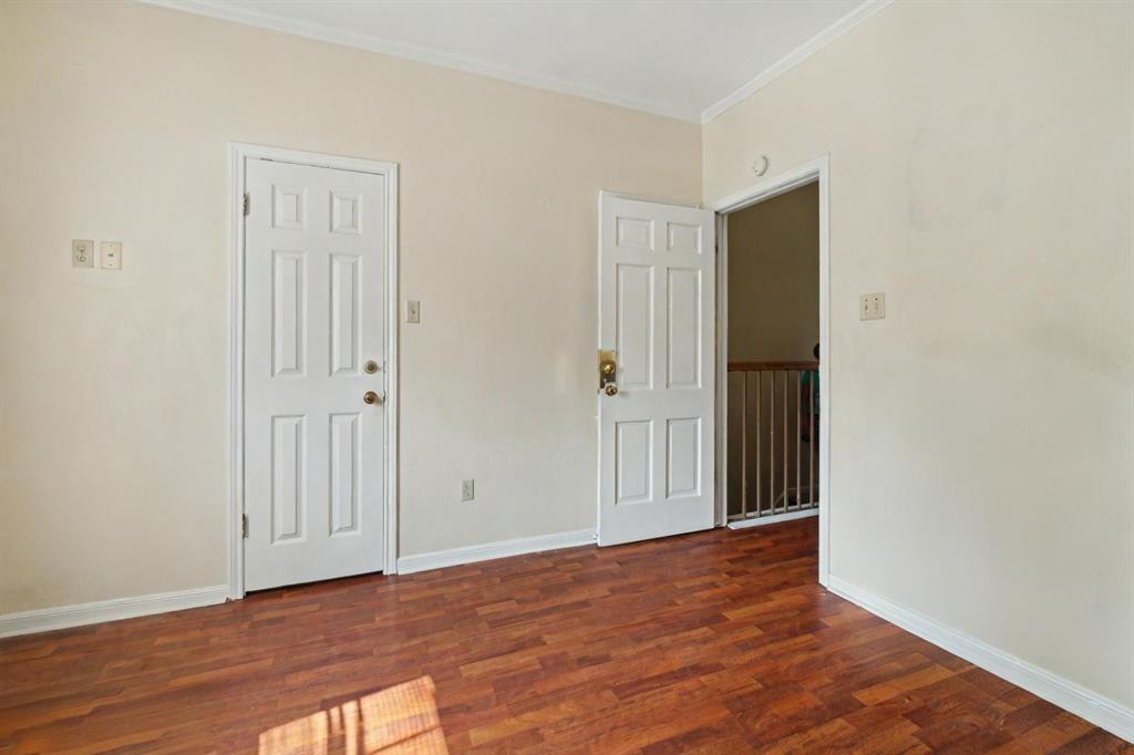 2529 Rio Grande Street, Unit 81 Austin, TX 78705 - Photo 7 of 13 a view of an empty room with wooden floor
