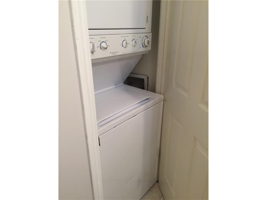 2529 Rio Grande Street, Unit 81 Austin, TX 78705 - Photo 10 of 13 a utility room with dryer and washer