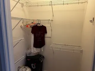 a bathroom with a sink vanity and a mirror