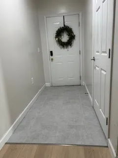 a view of a kitchen from the hallway