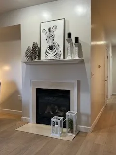 a kitchen with a refrigerator sink and cabinets