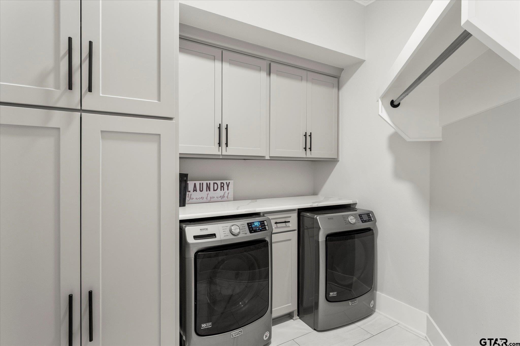 4301 Windrush Boulevard Longview, TX 75604 - Photo 26 of 36 a utility room with dryer and washer