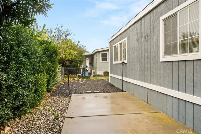 a backyard of a house with lots of green space