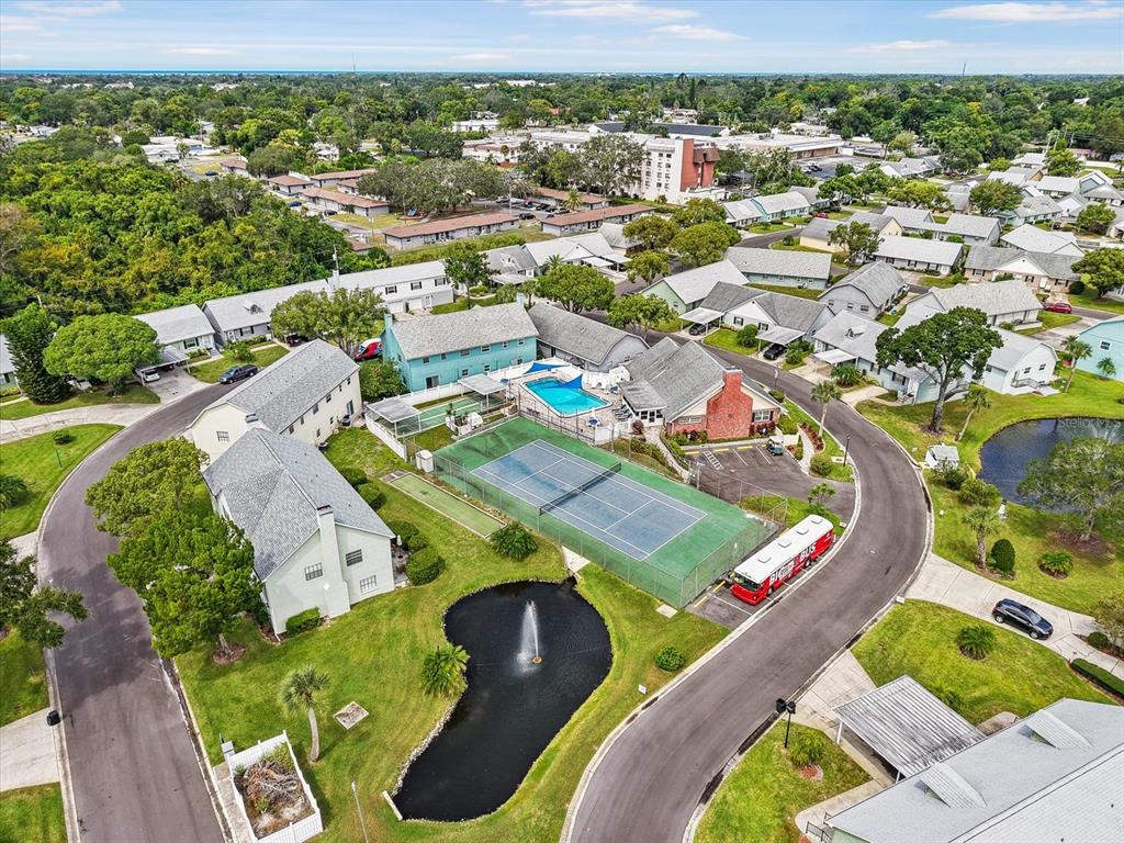6636 Timbercove Lane New Port Richey, FL 34653 - Photo 20 of 20 an aerial view of a swimming pool yard and outdoor seating
