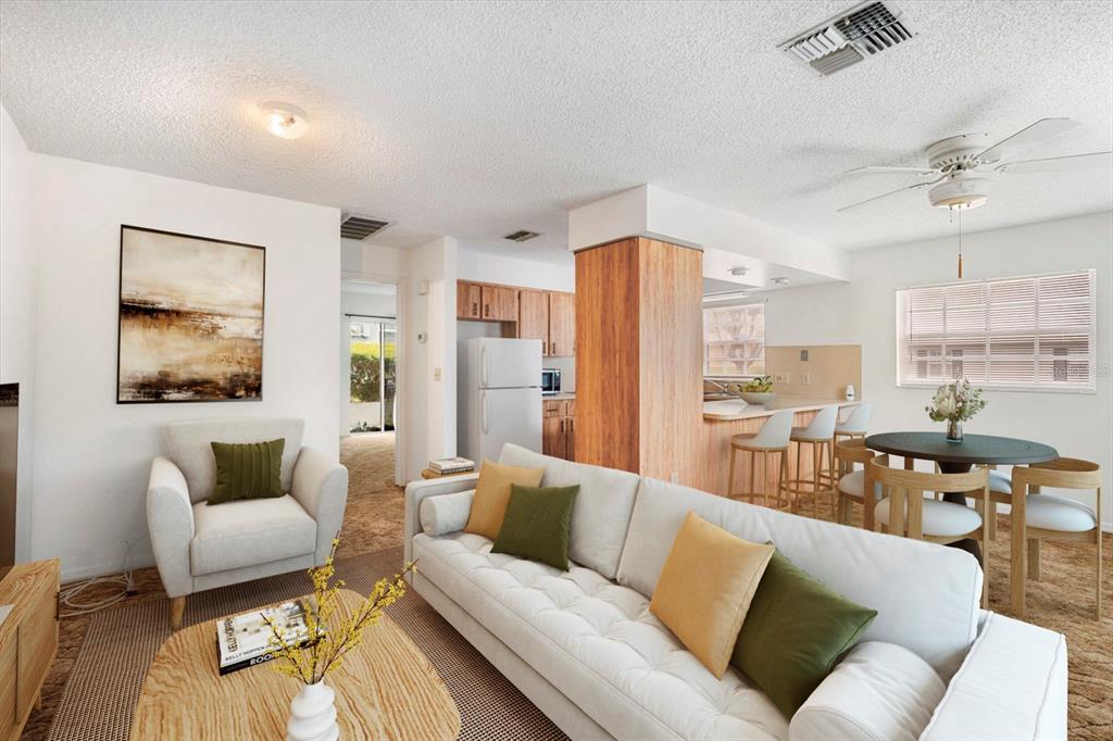 6636 Timbercove Lane New Port Richey, FL 34653 - Photo 3 of 20 a living room with furniture and a large window