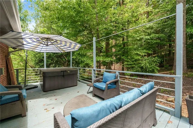 a view of a chairs and tables in the balcony