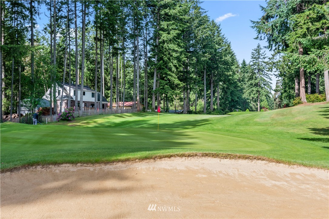 8810 Johnson Road Anderson Island, WA 98303 - Photo 4 of 11 a view of a park with large trees