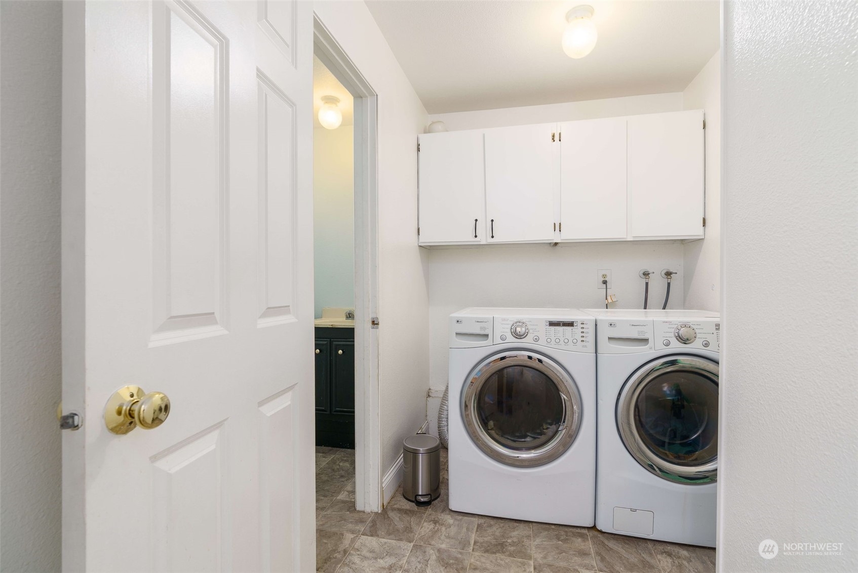 5033 Tri Lake Loop Southeast Olympia, WA 98513 - Photo 26 of 34 a utility room with dryer and washer