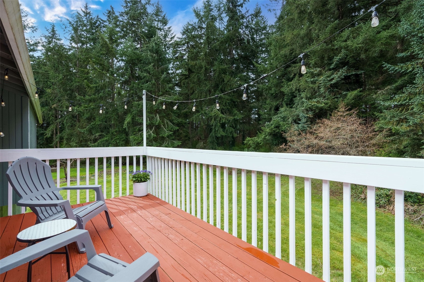 5033 Tri Lake Loop Southeast Olympia, WA 98513 - Photo 10 of 34 a view of a wooden deck with furniture
