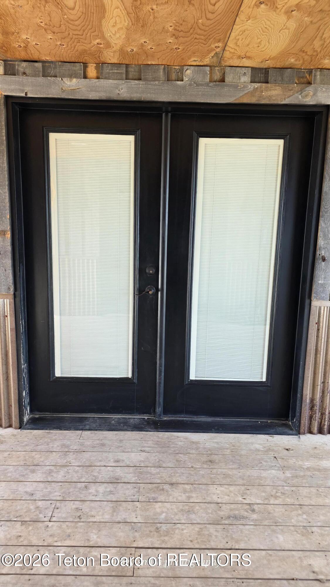 118 Upper Picnic Ridge Road Bondurant, WY 82922 - Photo 12 of 33 Shade doors closed