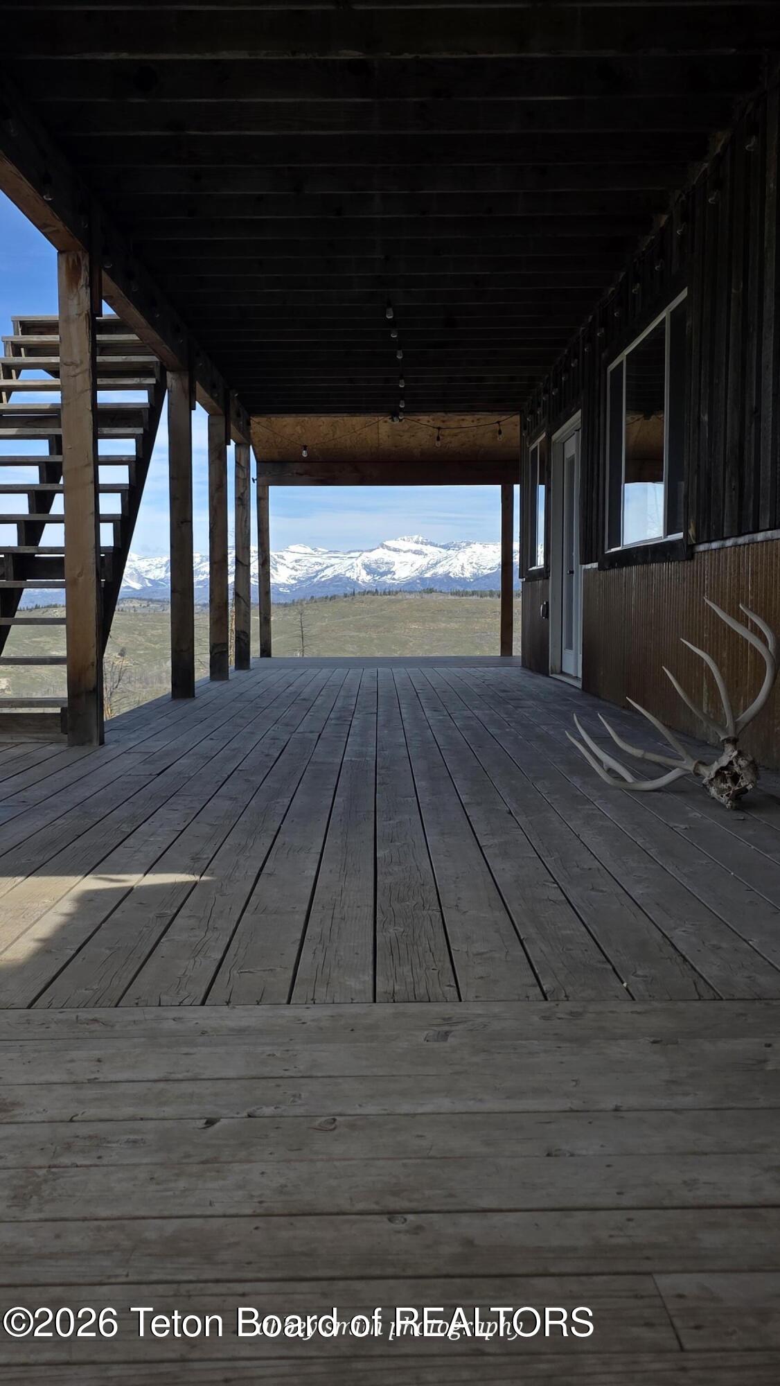 118 Upper Picnic Ridge Road Bondurant, WY 82922 - Photo 6 of 33 covered porch
