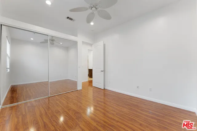a view of a hallway with washer and dryer