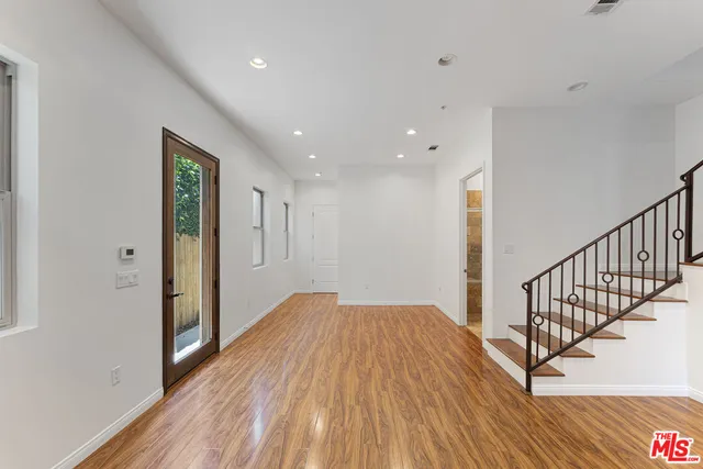 a view of a hallway with closet