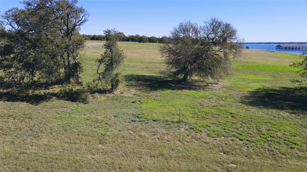 Lot 10 Triangle Shores Drive Corsicana, TX 75109 - Photo 24 of 40 a view of a lake with a yard