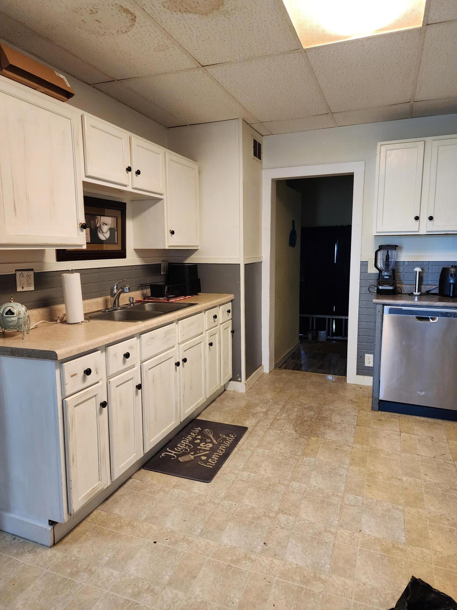 529 North Weston Street Rensselaer, IN 47978 - Photo 2 of 9 a kitchen with stainless steel appliances granite countertop a stove a sink and a refrigerator